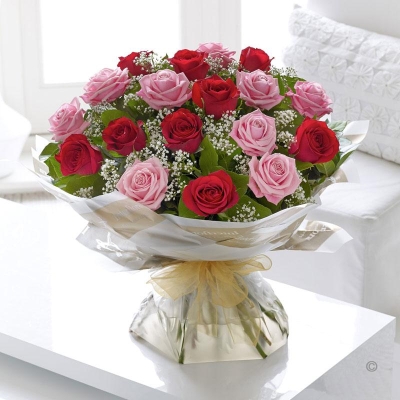 3.  Pink and Red Roses in a Hand Tied Bouquet