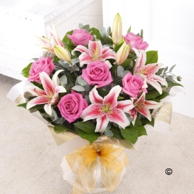 Pink Rose and Lily Hand tied with Chocolates*