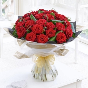 24 Grand Prix Rose Hand tied