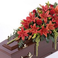 f. Casket Spray of Lilies and Roses in Red