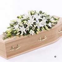 b. Casket Spray of Lilies in White