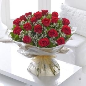 Red Roses in a Hand Tied Bouquet